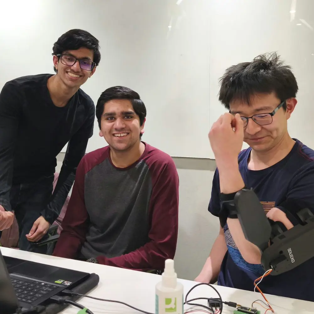Members of the Hacking Biomechanics Circle working at their desks